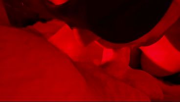 A Close Up View Of A Hot Blowjob A Red Light Video