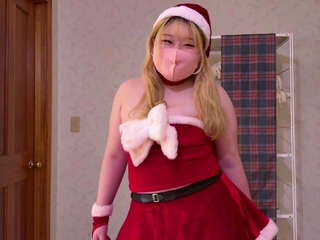 A Japanese Nurse Who Presents Toys At Santa Cos