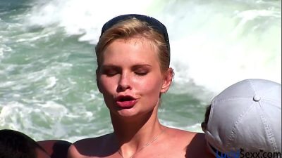 Beach slut with nice boobs gets DP’ed by two guys and takes cum down her throat and on her tits